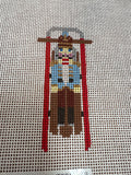 C-SS-01-Sled with Blue Nutcracker