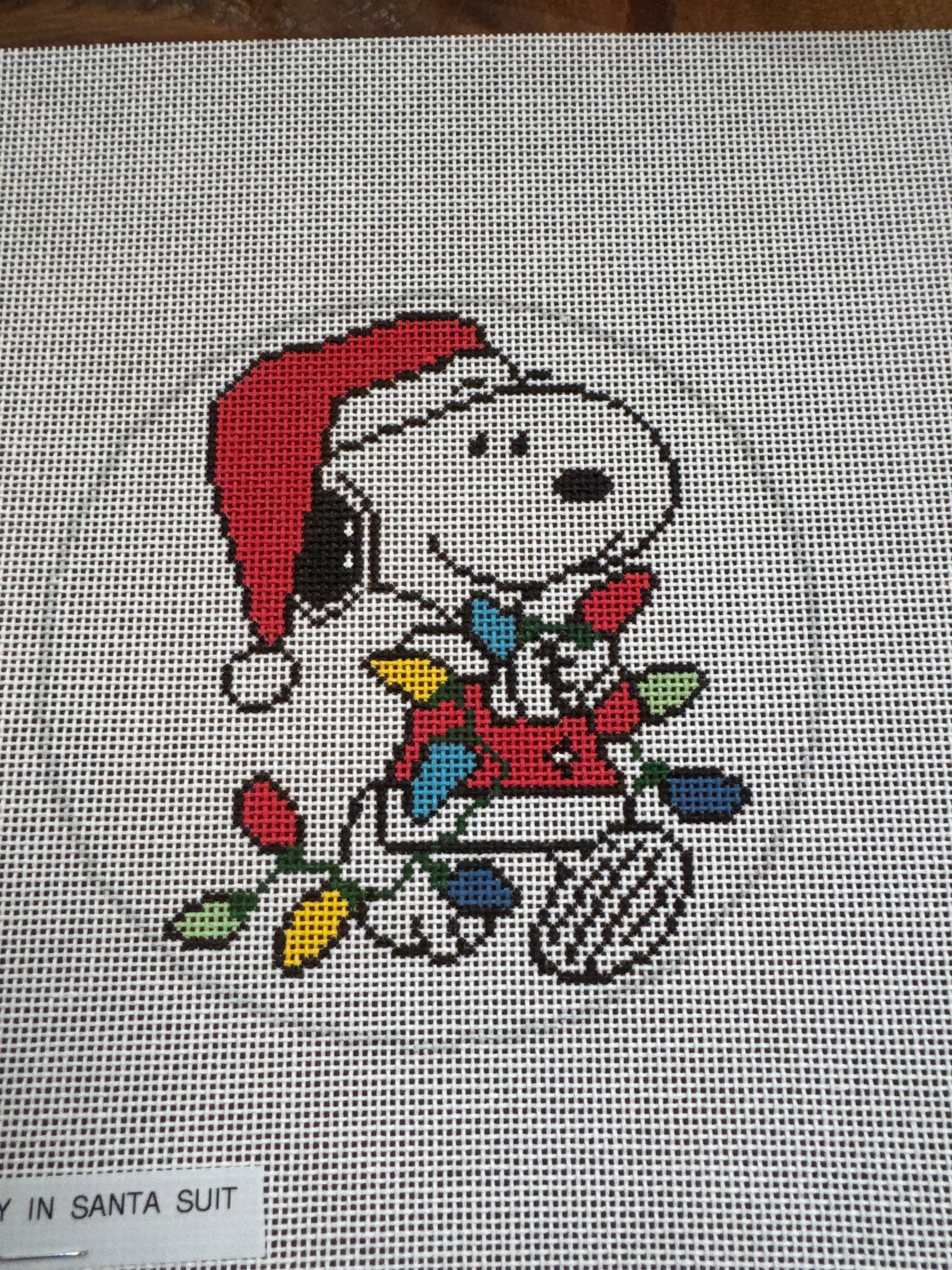 C-ON-03-Snoopy in Santa Suit Tangled in Lights
