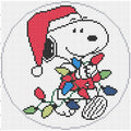 Snoopy in Santa Suit Tangled in Lights